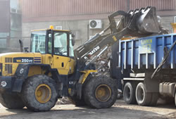 Skip Hire Bishops Stortford loading a lorry